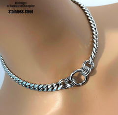 A discreet bdsm day collar; all shiny silver stainless steel; 8mm tight link curb chain with thick, 22mm center o-ring secured by 10 thick jump rings; waterproof, and permanent lock option.