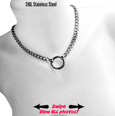 May include: A silver chain necklace with a silver ring pendant. The chain is a curb chain style. The text &#39;316L Stainless Steel&#39; is at the top of the image. The text &#39;Swipe View ALL Photos!&#39; is at the bottom of the image.